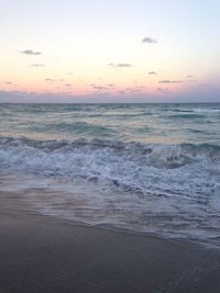 Scenic view of sea at sunset