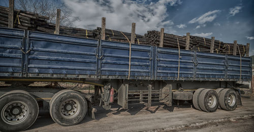 View of truck against cloudy sky