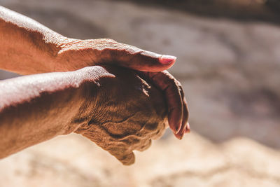 Close-up of cropped hands