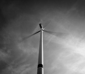 Low angle view of wind turbine against sky