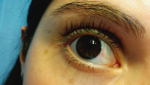 Extreme close-up portrait of teenage girl 