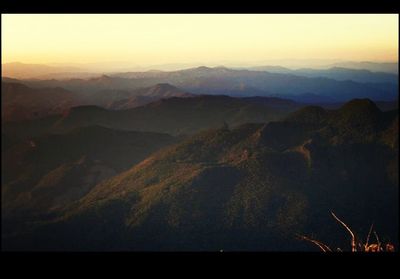 Scenic view of mountains at sunset