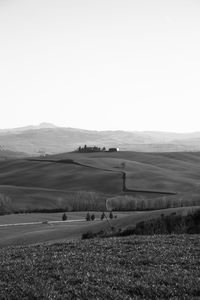 Scenic view of field against clear sky