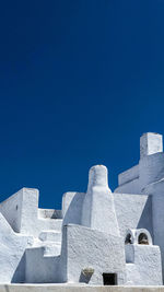 Low angle view of historical building against blue sky