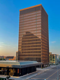 Low angle view of modern buildings against clear sky