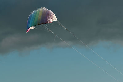 Low angle view of kite flying in sky
