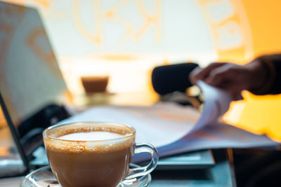 Coffee cup on table at cafe