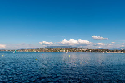 Scenic view of sea against blue sky