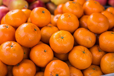 Close-up of oranges for sale at market stall