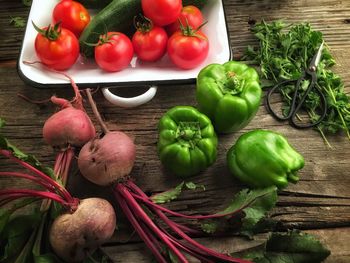 High angle view of various vegetables on wooden table