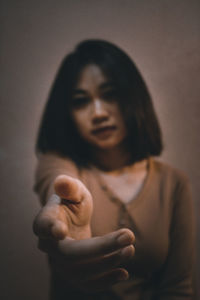 Portrait of a beautiful young woman with eyes closed