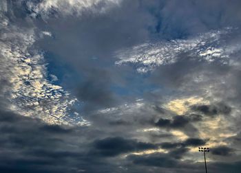 Low angle view of cloudscape against sky during sunset