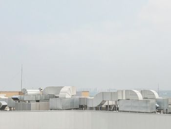 View of built structures against clear sky