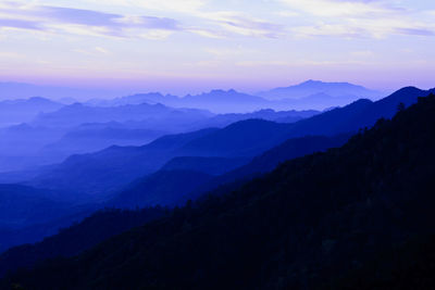 Scenic view of mountains against dramatic sky