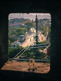 High angle view of railroad tracks seen through window