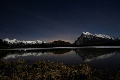 Scenic shot of calm lake at night