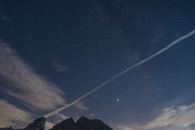 Low angle view of star field against sky at night