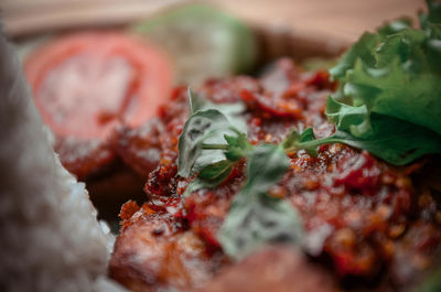 Close-up of pizza served in plate