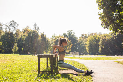 Woman sitting in park