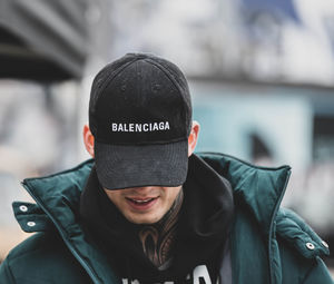 Portrait of young man wearing hat