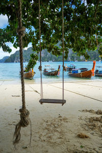 View of swing on beach