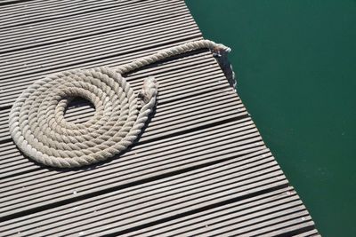 High angle view of rope tied on boat