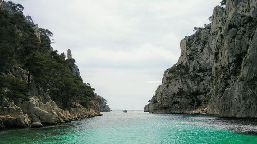 Scenic view of sea against cloudy sky