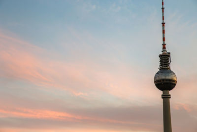 Low angle view of fernsehturm against sky