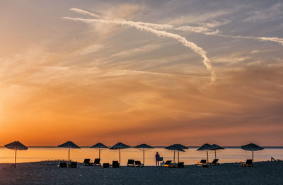 Scenic view of sea against sky at sunset