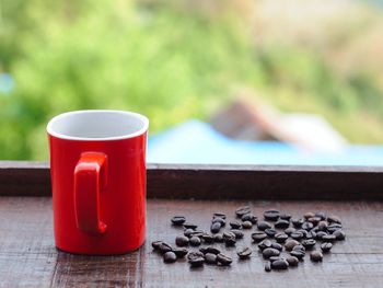 Close-up of coffee cup on table