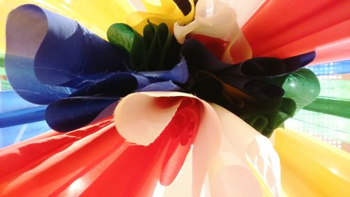 Close-up of multi colored umbrellas