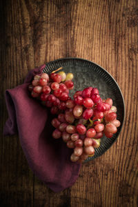 High angle view of strawberries in bowl on table