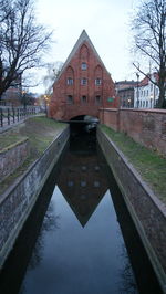 View of river with buildings in background