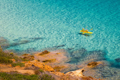 High angle view of person swimming in sea