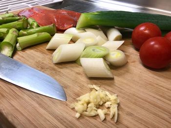High angle view of chopped vegetables on cutting board