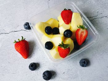 High angle view of chopped fruits in bowl