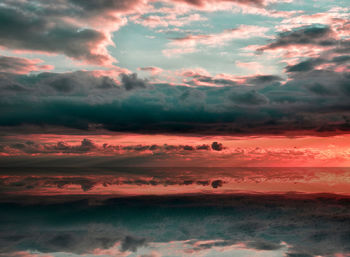 Low angle view of dramatic sky during sunset