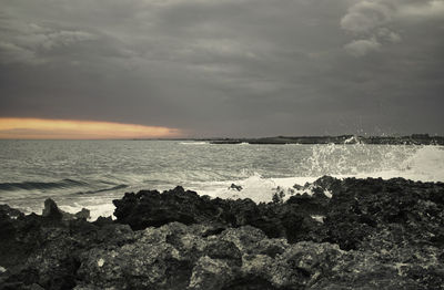 Scenic view of sea against sky during sunset