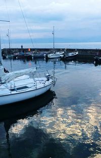 Boats moored in sea