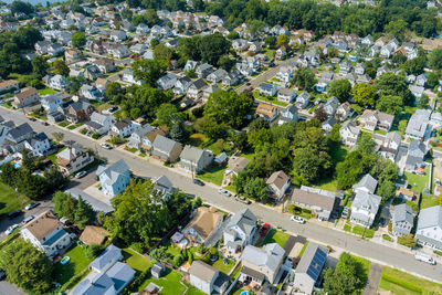 High angle view of street amidst buildings in town