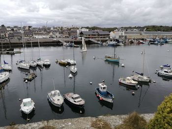 High angle view of boats moored at harbor