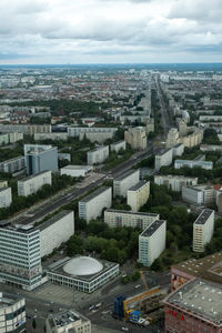 High angle view of buildings in city against sky