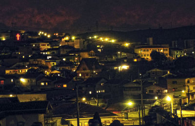 High angle view of illuminated cityscape at night