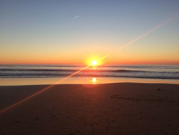 Scenic view of sea at sunset