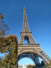 Low angle view of eiffel tower against sky in city