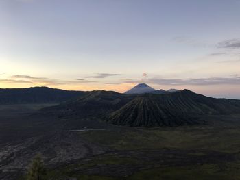 Scenic view of volcanic landscape against sky