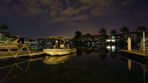 Reflection of buildings in water at night