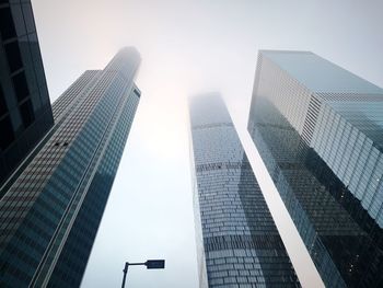 Low angle view of modern buildings against clear sky