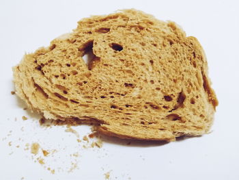 Close-up of bread against white background