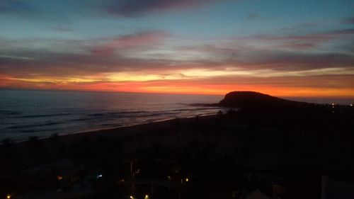 Scenic view of sea at sunset